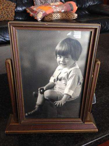 Antique wooden swinging picture frame